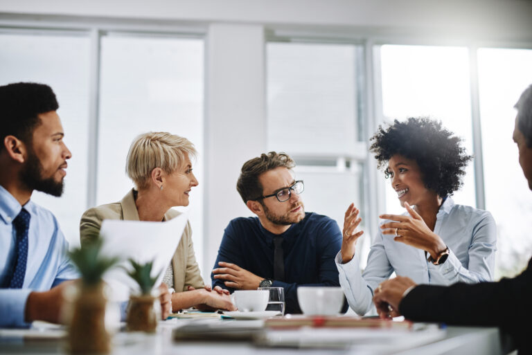 I need everyone to give me their best ideas. Shot of a group of businesspeople sitting together in a meeting. Shot of a group of businesspeople sitting together in a meeting